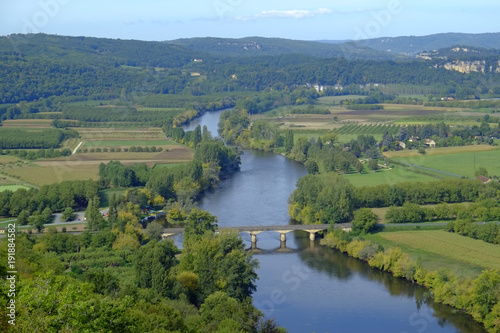 Late summer view over patchwork fields and river of the Dordogne valley from Domme, Aquitane, France photo