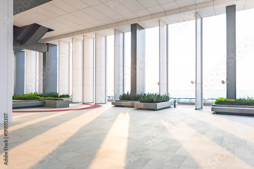 interior of modern office, Abstract Background. Store, interior, office, elegant stools and table in huge and bright hall, Resting area of a building, wide space in a building.