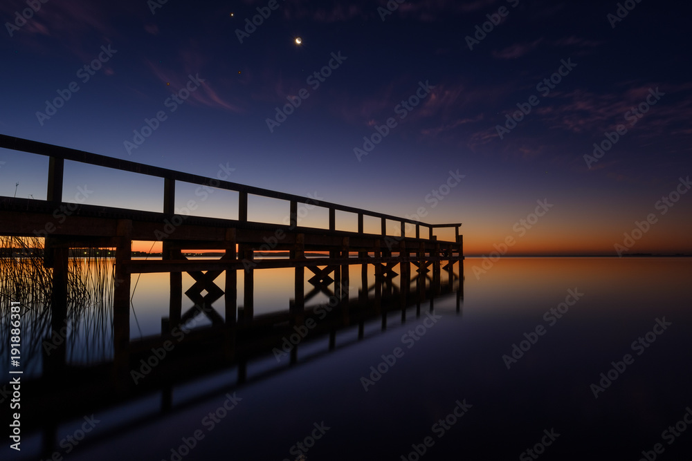Sunset pier at lake Jindabyne, Australia