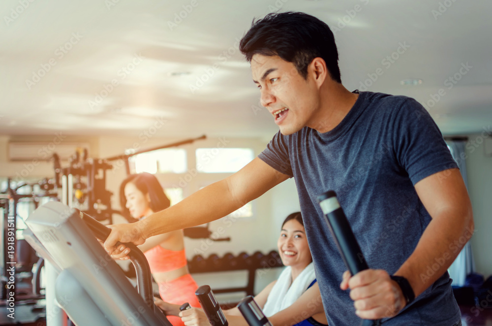 motion of muscular young asian man exercising his legs cardio running on treadmill and powerful shouting screaming in fitness gym, bodybuilder, lifestyle, exercise, workout, sport training concept motion of muscular young asian man exercising his legs cardio running on treadmill and powerful shouting screaming in fitness gym, bodybuilder, lifestyle, exercise, workout, sport training concept