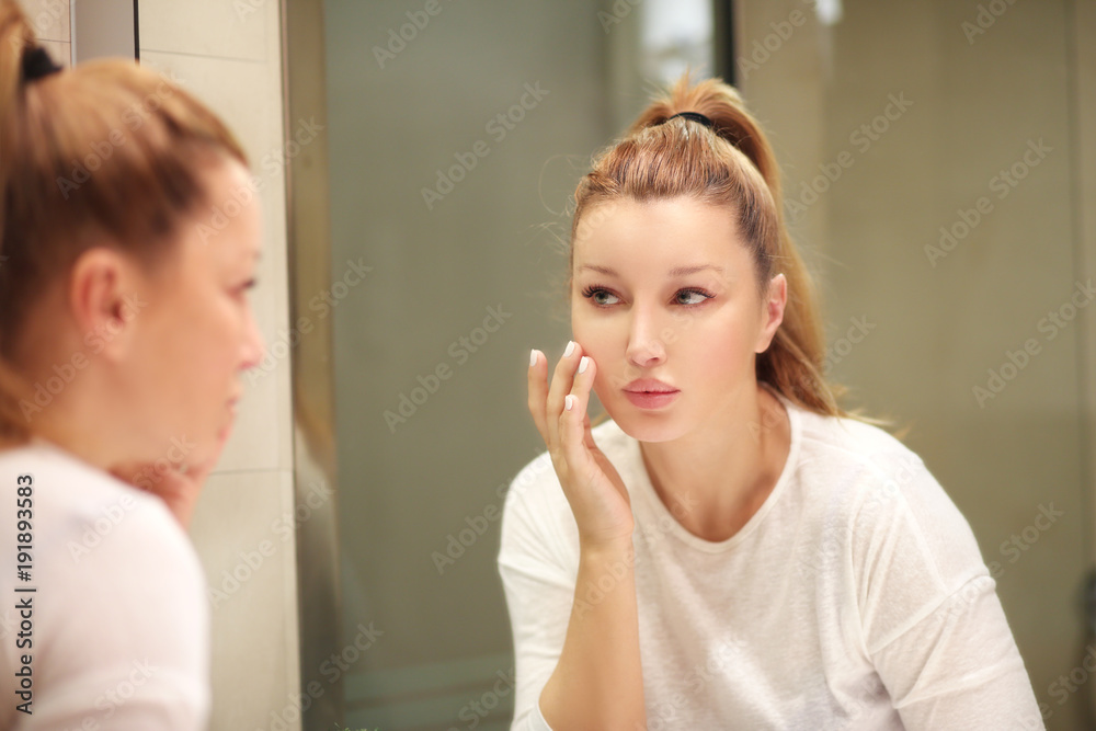 Magic anti-aging cream.Applying the cream Magic anti-aging cream.Applying the cream