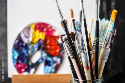 Artistic equipment. Brushes and paints for drawing. Items for children's creativity.