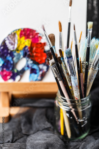 Artistic equipment. Brushes and paints for drawing. Items for children's creativity.