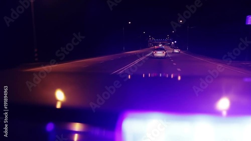 point of view police car top turning lights