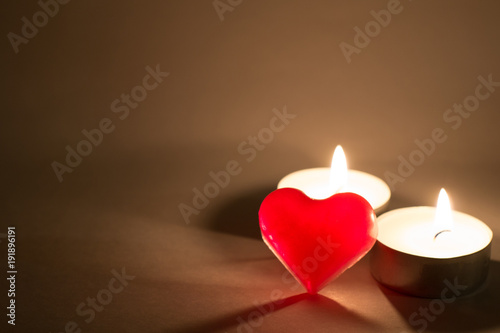 Red heart and two candles.Valentine