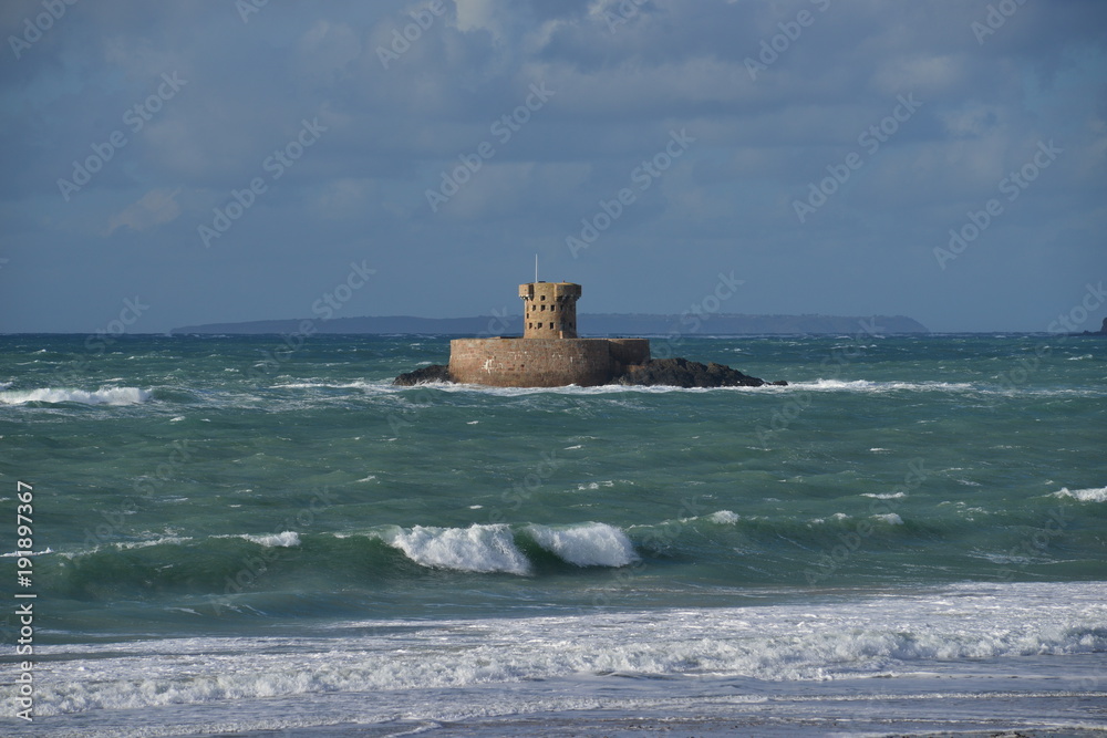 Rocco tower, Jersey, U.K.
Uninhabited 19th century military tower of St Ouens bay with Sark on the horizon.