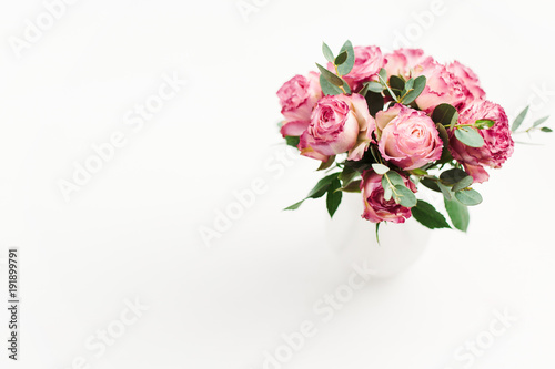 Pink rose flowers bouquet on white background. Minimal spring floral concept. © Floral Deco