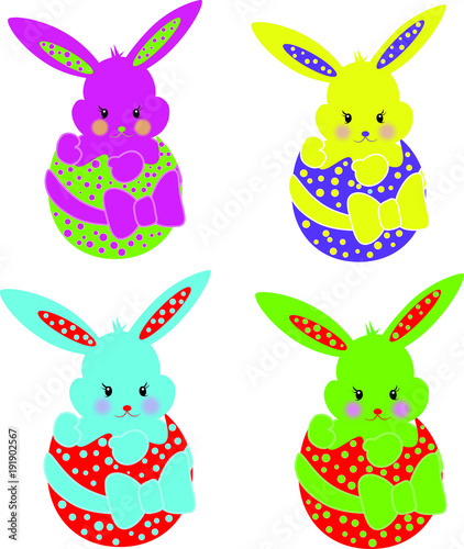 Cztery zajączki wielkanocne w jajku. 