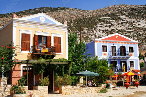 Traditional houses by the harbour of the town of Kastellorizo, Kastellorizo island, Dodecanese islands, Greece.