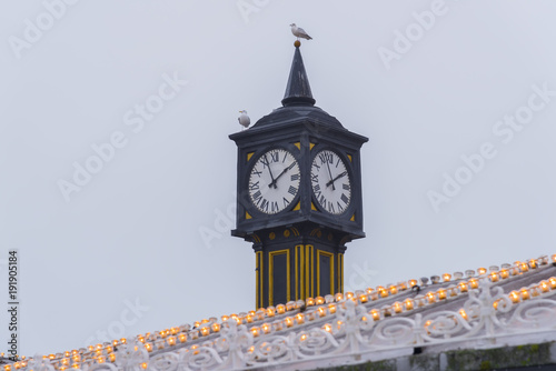 Clock at the entrance to Brighton Pier East Sussex United Kingdom