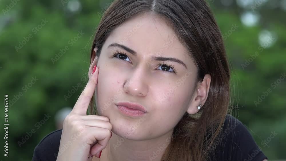 Pretty Female Teen Girl Thinking Having An Idea Pretty Female Teen Girl Thinking Having An Idea