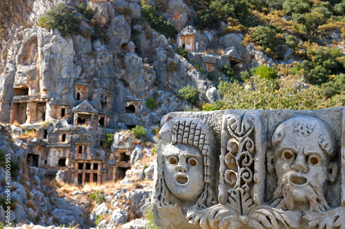 Ancient lycian Myra rock tomb ruins in Demre, Antalya.