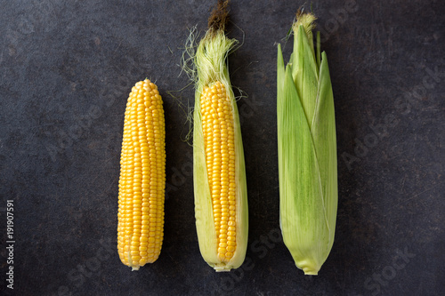Fresh corn, Fresh corn on cobs on table closeup.