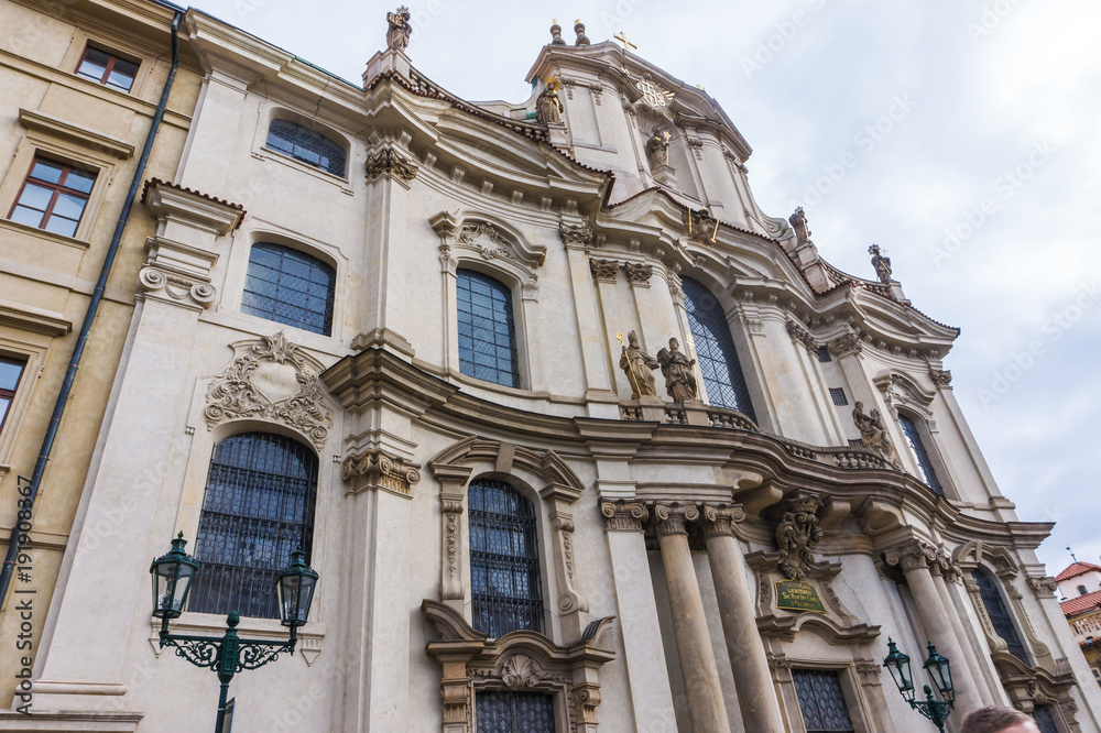 St.Nicholas Church in the quarter of Mala Strana in Prague in Central Europe, facade of Baroque architecture