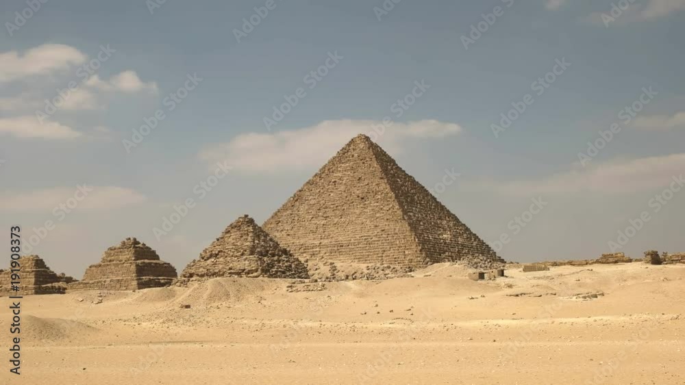 low angle pan of pyramids at giza near cairo, egypt low angle pan of pyramids at giza near cairo, egypt