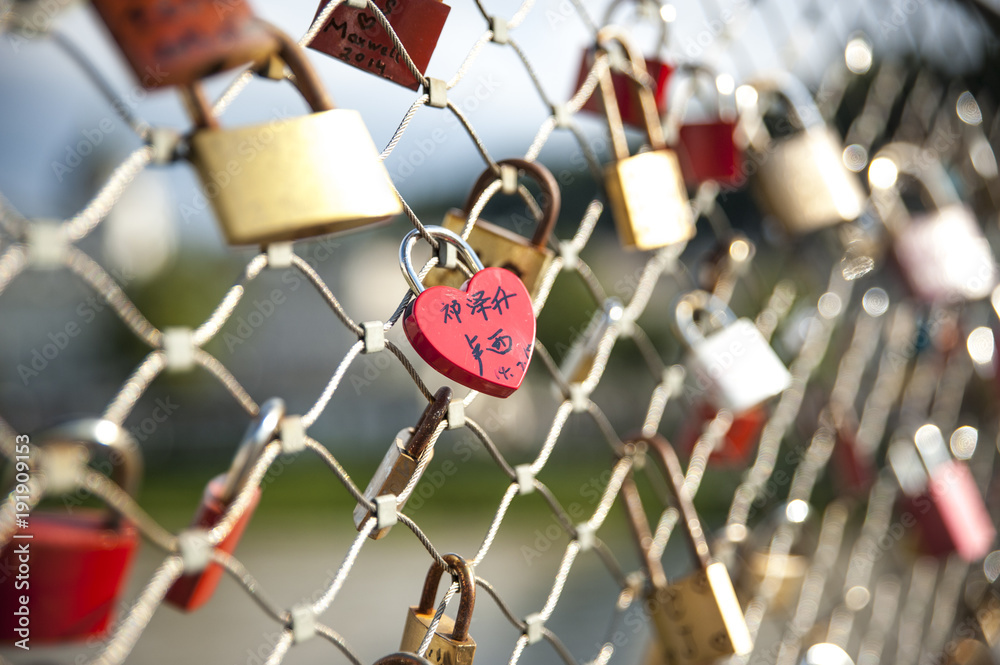 as a promise of love, the lovers close padlocks along the bridges as a promise of love, the lovers close padlocks along the bridges