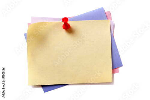 Various colors sticky oblong post it note yellow on top pushpin isolated white background photo