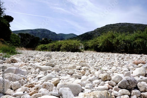 Botanical park with dry river bed in Benigembla photo