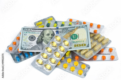 Money and pills: a symbol of the rising cost of medicines in the world 2018