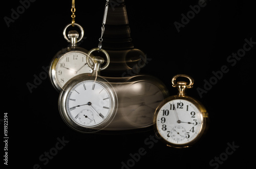 Swinging Pocket Watches Beckoning You to Look More Closely