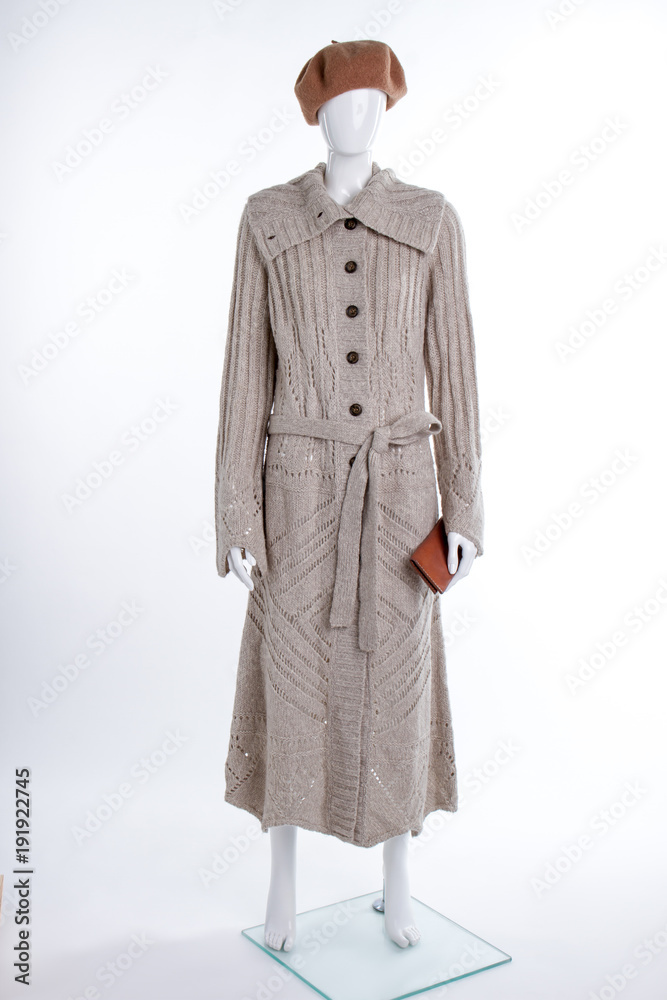 Female beret, knitted cardigan and wallet. Full length female mannequin with grey long cardigan and accessories. Ladies fashion and style. Female beret, knitted cardigan and wallet. Full length female mannequin with grey long cardigan and accessories. Ladies fashion and style.