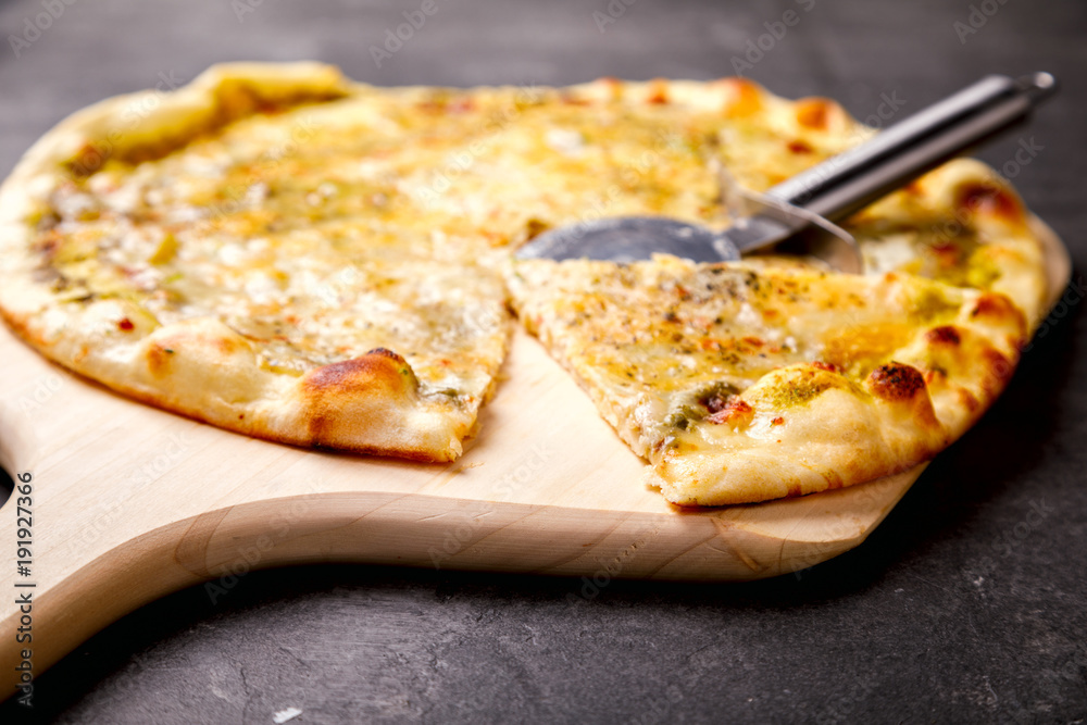 Pizza Four Cheese with a Vessel Assortment on the Stone Background Baking Snack Pizza Four Cheese with a Vessel Assortment on the Stone Background Baking Snack