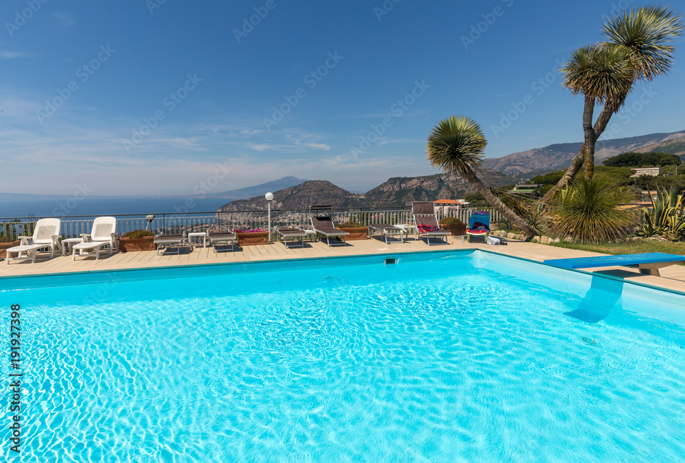 Swimming pool on the Amalfi Coast with views of the Gulf of Naples and Vesuvius. Sorrento. Italy