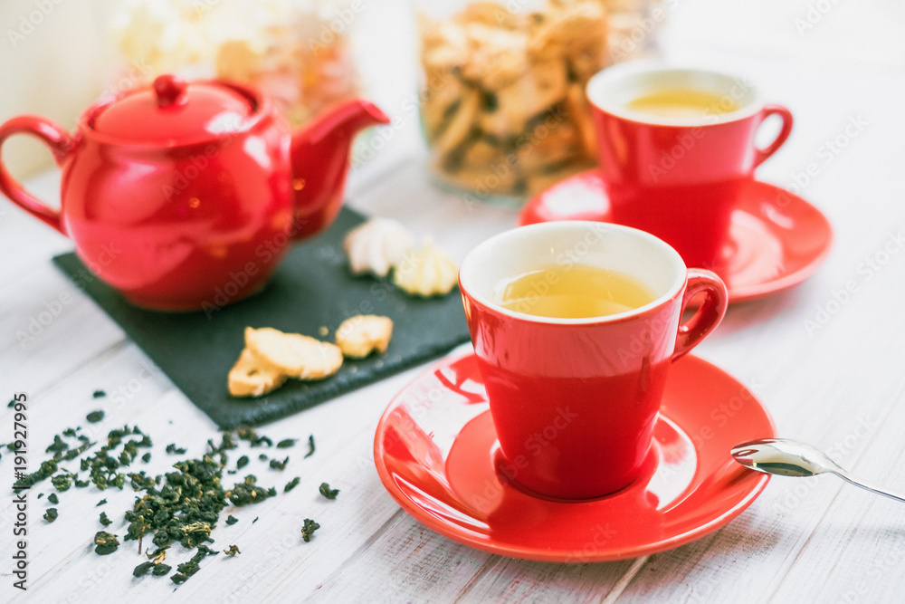 tea set in a red mug tea set in a red mug