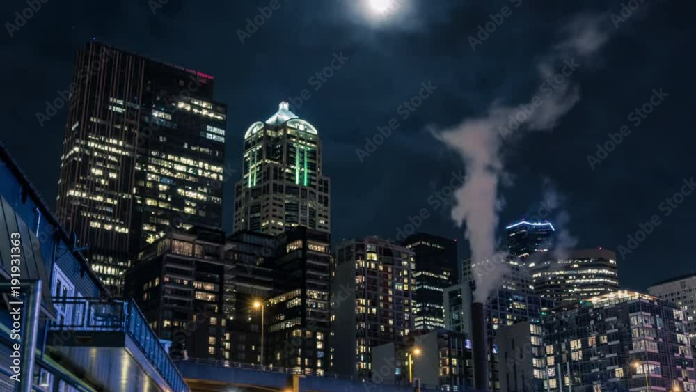 City Skyline Buildings Time-Lapse Illuminated at Night City Skyline Buildings Time-Lapse Illuminated at Night
