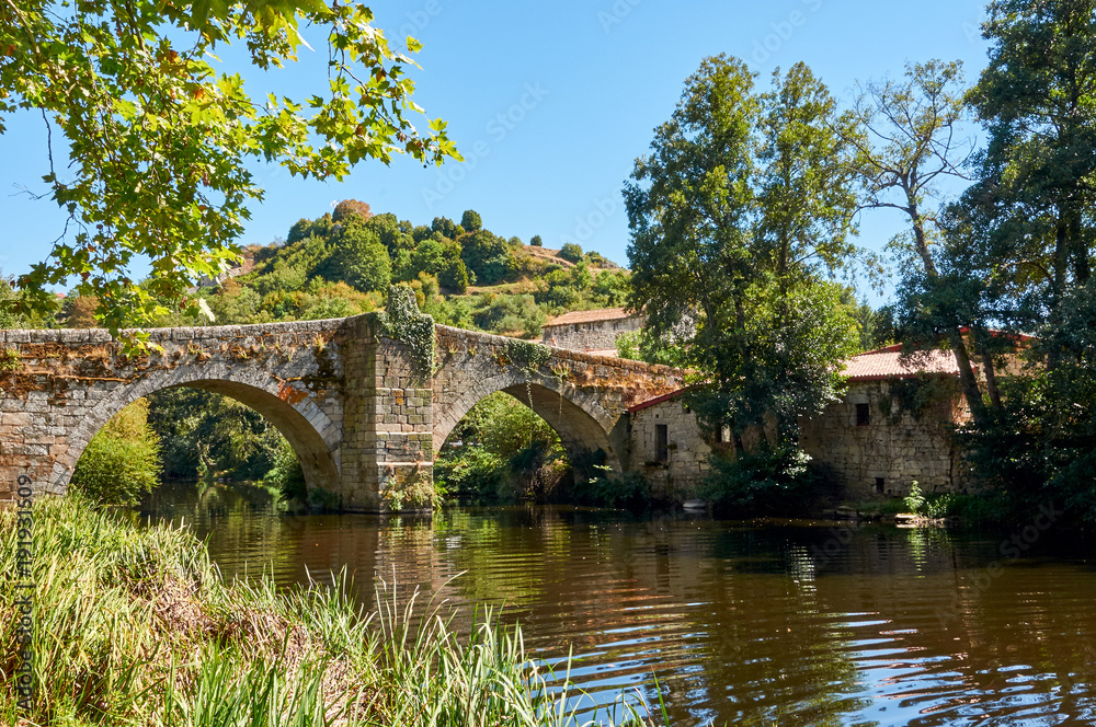 Medieval bridge over Arnoia river in Allariz Ourense, Spain