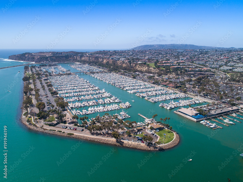 Aerial view of harbor with luxury boats and yachts