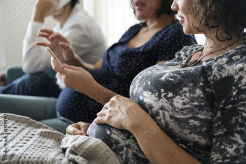 Pregnant support group meetup in a house