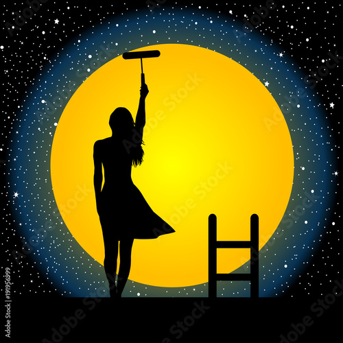 Girl paints the moon and the stars photo