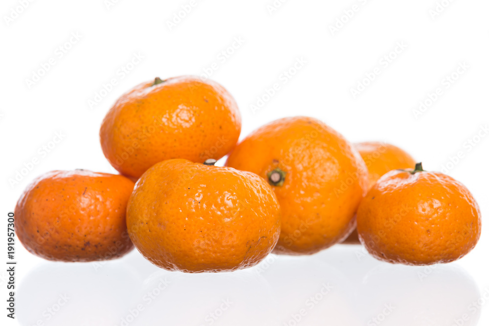 Close up of a mandarin orange isolated on white Close up of a mandarin orange isolated on white