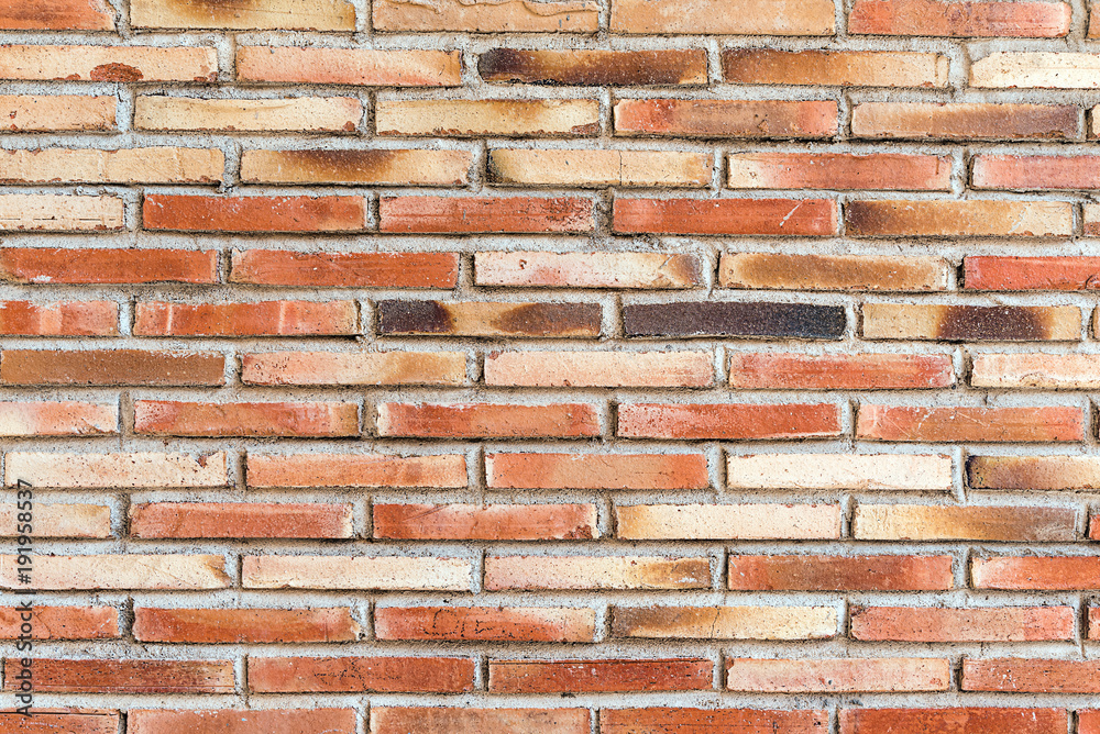 Fototapeta premium Background from an old and rugged red brickwall