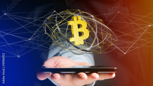 Businessman using a smartphone with a Bitcoin crypto currency sign flying around a network connection - 3d render