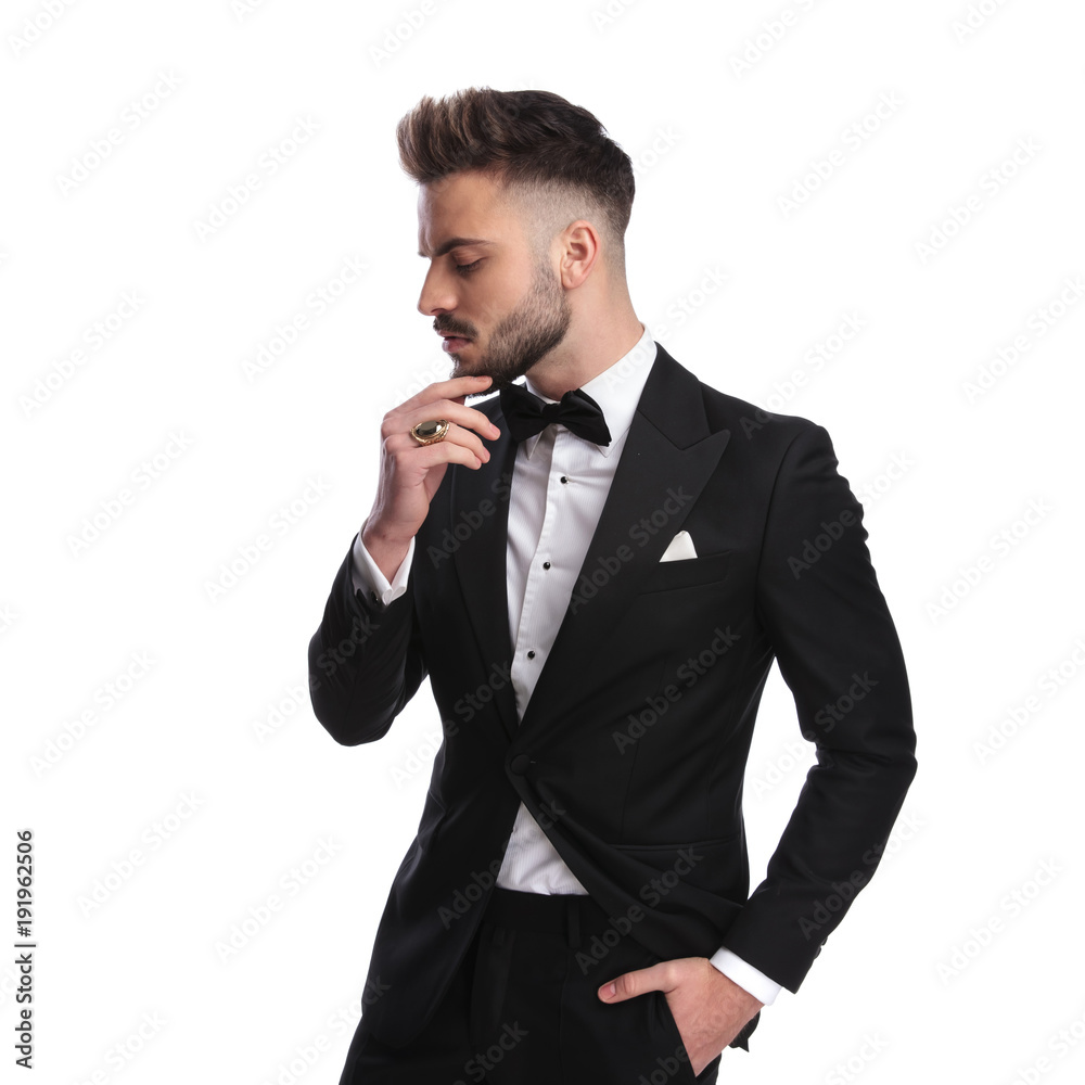 profile portrait of a pensive elegant man in ceremony suit profile portrait of a pensive elegant man in ceremony suit