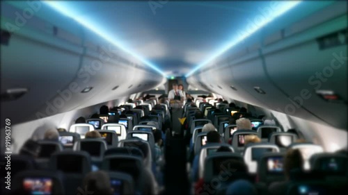 People riding on a bumpy commercial airline in their seats