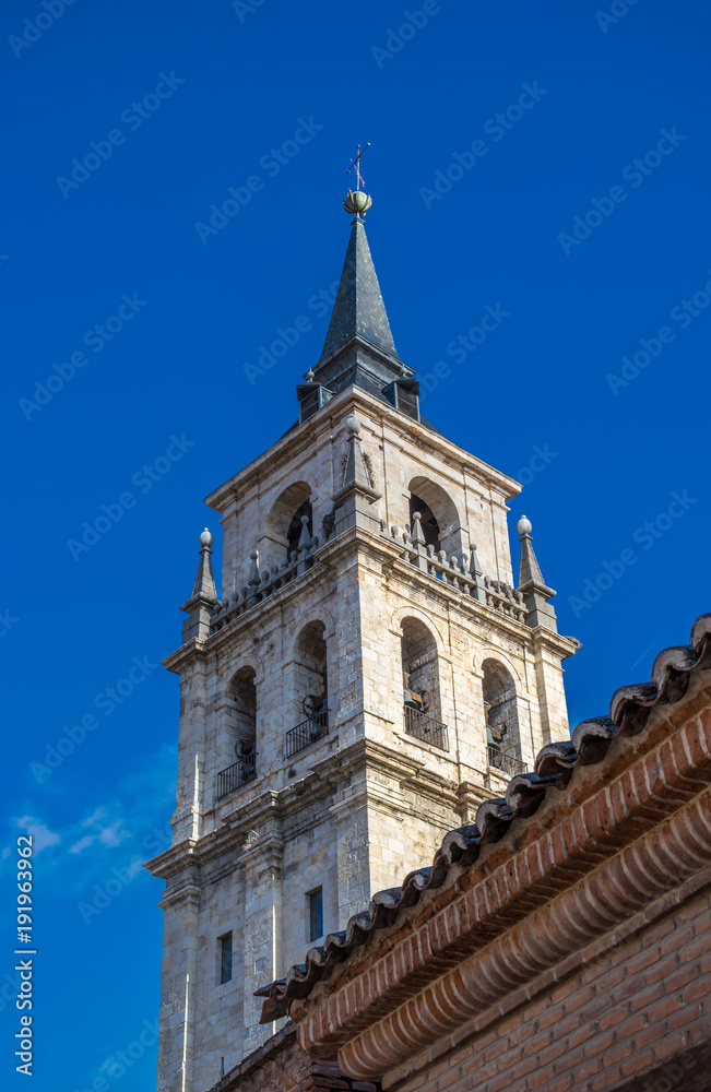 Holy Children cathedral tower (Santos Niños cathedral) in Alcalá de Henares, Spain. Located in the historical center of the city, the high tower is built in Renaissance style and measures 62 meters. 