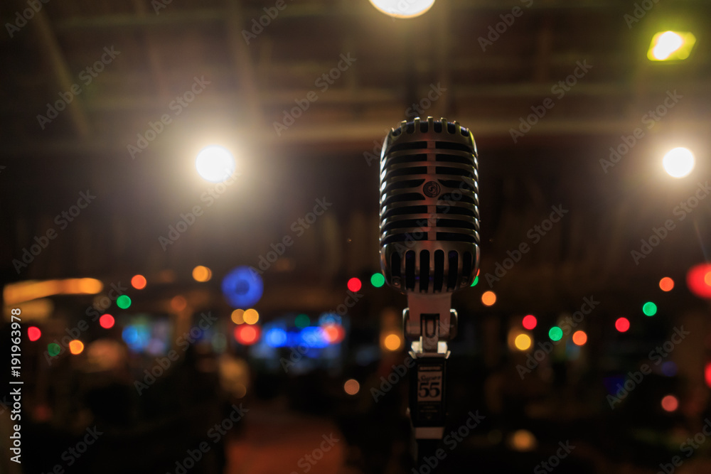 Retro microphone on stage in a pub
