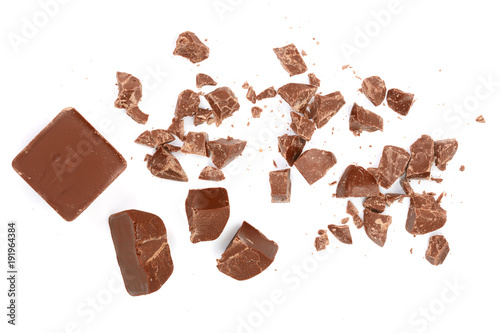 Chocolate pieces isolated on white. Top view. Flat lay