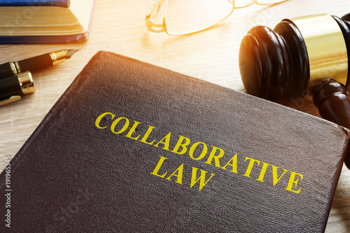 Collaborative Law or collaborative practice, divorce or family law on a desk.