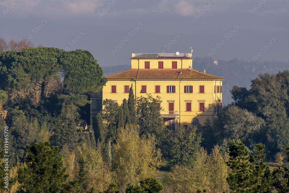 Fototapeta premium Beautiful Tuscan manor house surrounded by a park, Pisa, Tuscany, Italy