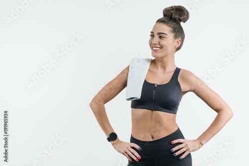 Portrait of positive caucasian female athlete in good fit.