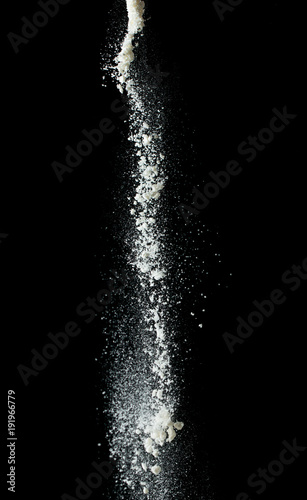 flour on a black background