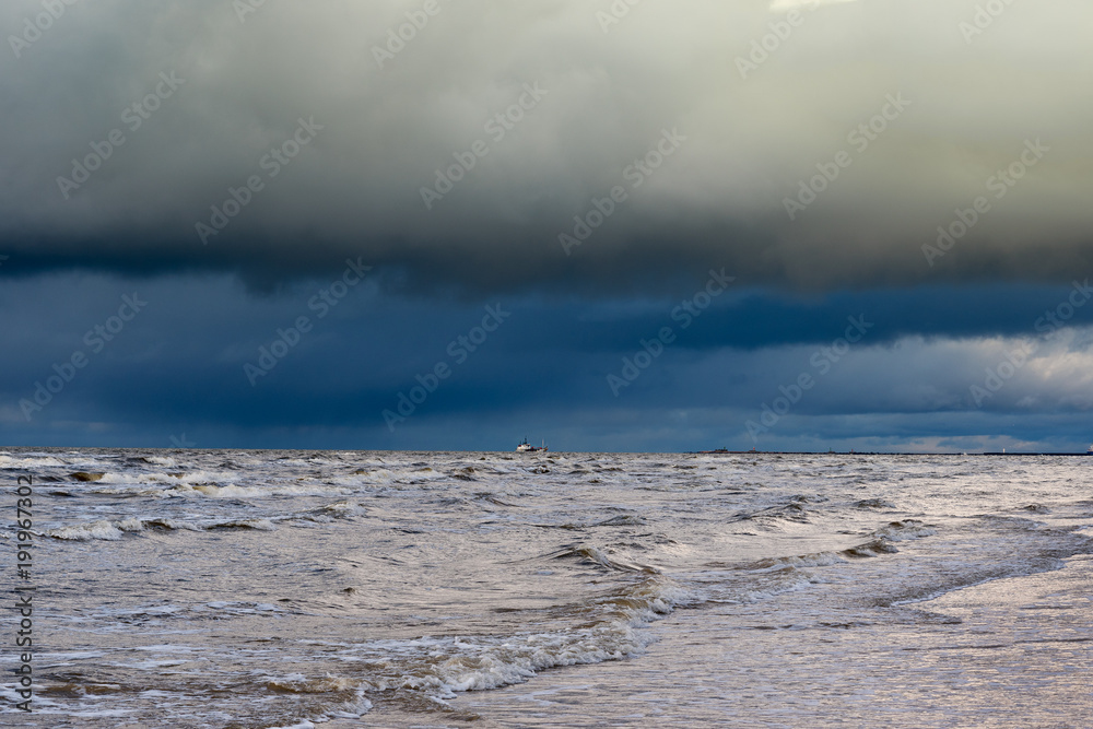 Restless Baltic sea in evening time.