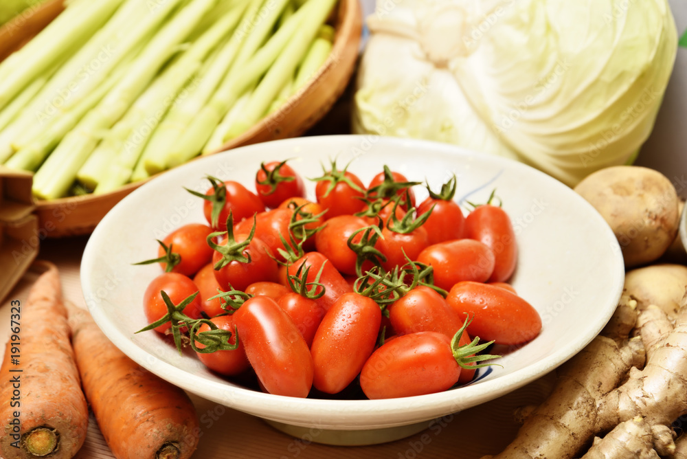 A pile of cherry tomatoes on the plate