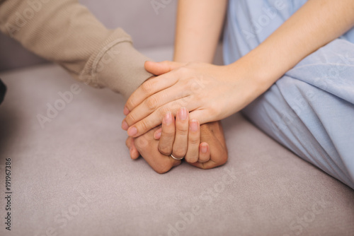 Couple in love. Man and woman holding hands together