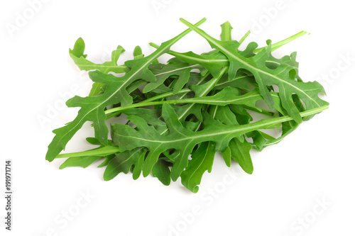 Heap of Green fresh rucola or arugula leaf isolated on white background