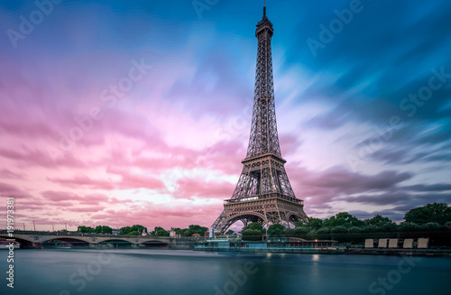 Long exposure photographyof the Eiffel Tower from Seine river with evening purpl Fototapeta